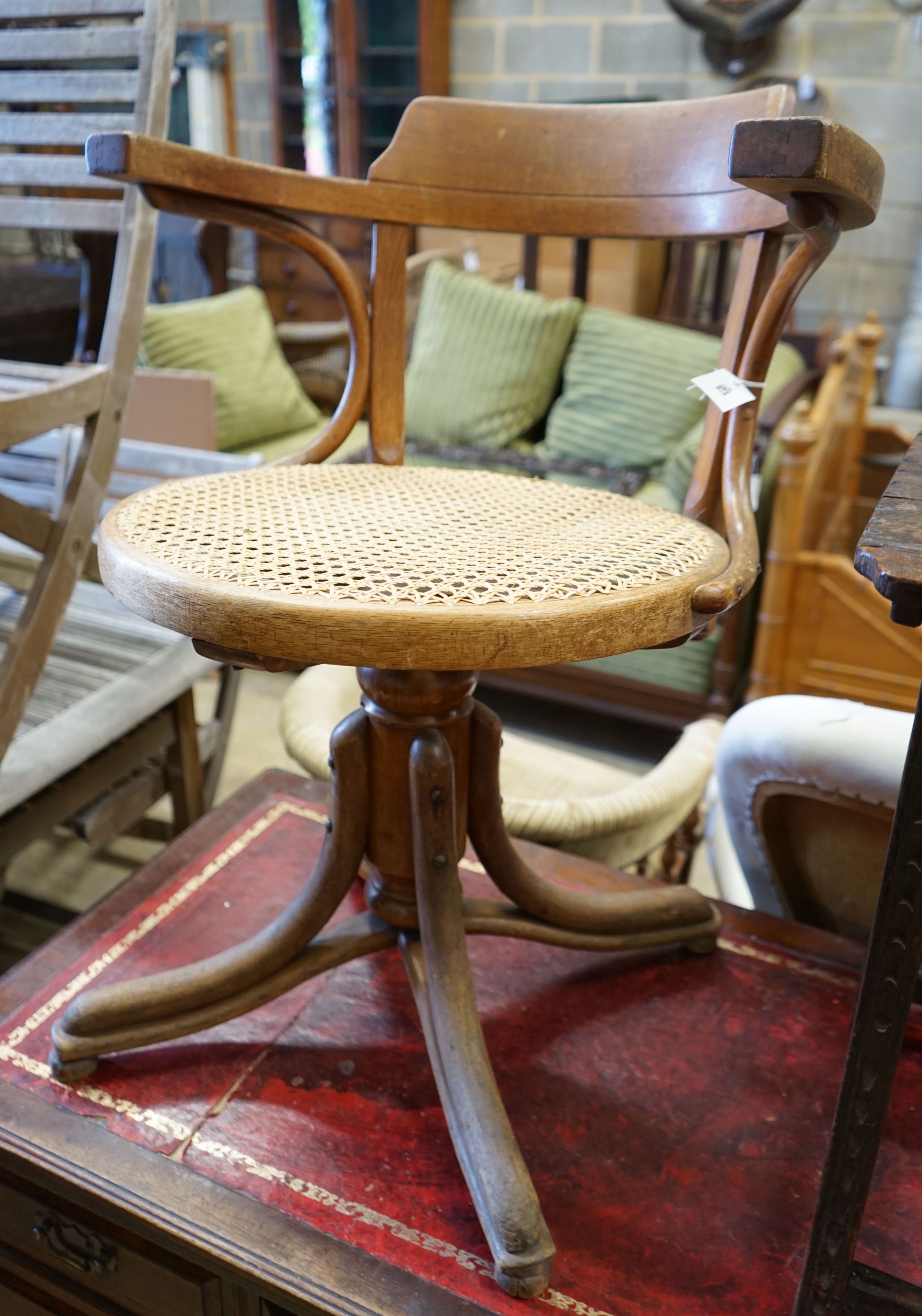 A cane seat bentwood office chair